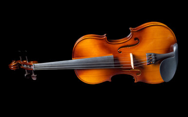 Fototapeta na wymiar Violin lying on its side isolated on black background.