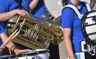 a tube in the hand of a musician