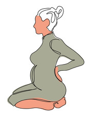 Pregnant woman sitting on her knees in profile in a dress on a white background