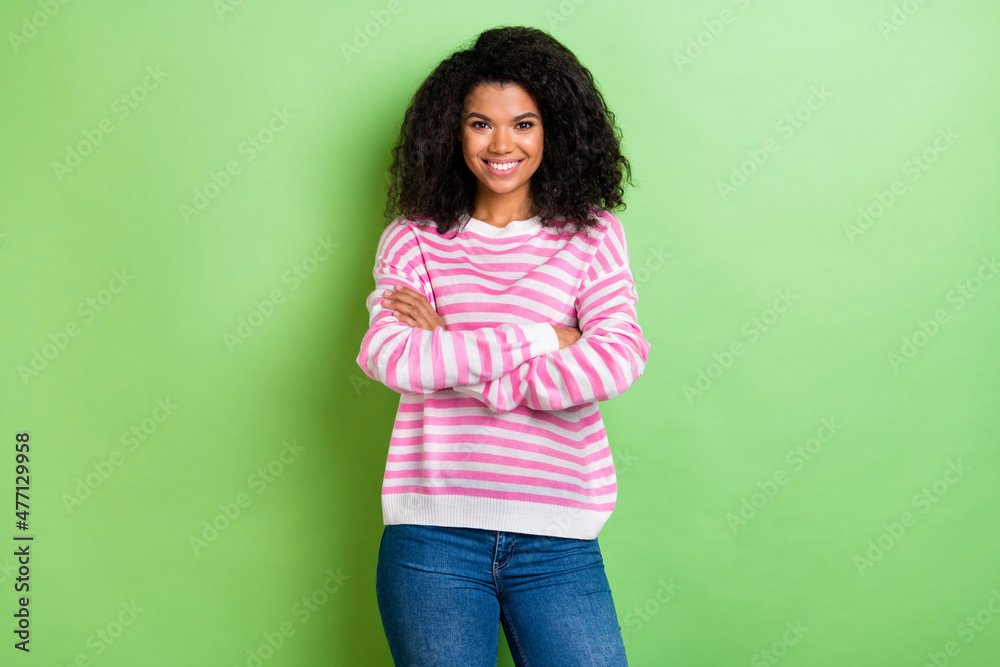 Canvas Prints Portrait of attractive content brunet cheerful girl folded arms isolated over bright green color background