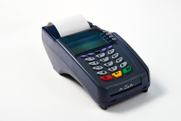 Payment terminal on white background with copy space. Credit card reader for buying selling. Contactless shopping service
