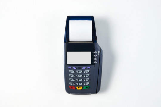 Payment terminal on white background with copy space. Credit card reader for buying selling. Contactless shopping service
