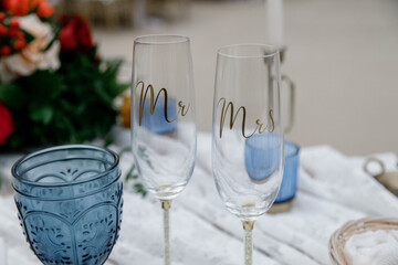 Wedding Mr and Mrs personalize glasses A closeup shot of champagne sparkling wine glasses Empty...