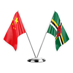 Two table flags isolated on white background 3d illustration, china and dominica