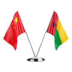 Two table flags isolated on white background 3d illustration, china and guinea-bissau