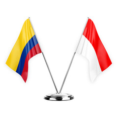 Two table flags isolated on white background 3d illustration, colombia and indonesia