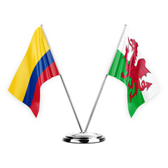 Two table flags isolated on white background 3d illustration, colombia and wales