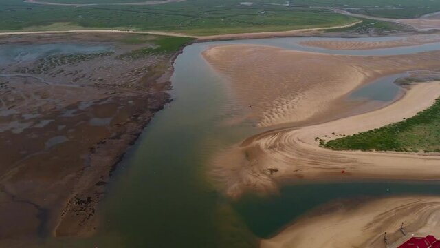 Aerial Drone Shot Showing Patterns Of Water With Sand On The AONB Norfolk Coast