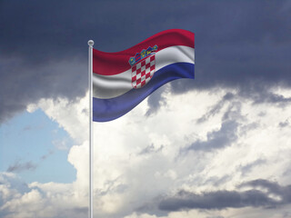 Flag of the Croatia on a stick, dark clouds in the background