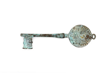 Old rusty door key isolated on white.