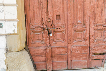 Old door with an interesting ornament, close-up.