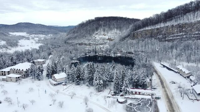flight to the lake in the mountains in winter