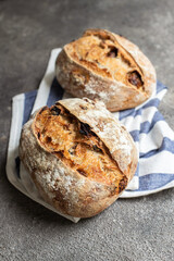 Freshly baked sourdough bread with dried tomatoes.