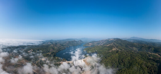 beautiful panoramic landscape aerial view mae suai dam or reservoir blue sky background at chiang rai Thailand