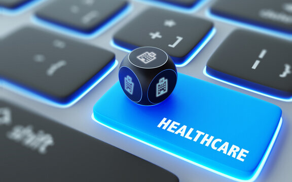Hospital Symbol On A Dice Over Laptop Computer Keyboard with Healthcare Text on Enter Button