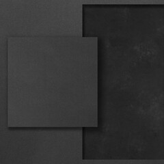 Black rectangular mockups on a dark concrete background. Design elements or portfolio. Copy space.