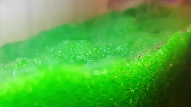 Close up of spinning machine for frozen fruit drinks like slushies.