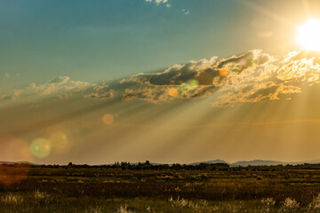 USA, Idaho, Bellevue, Late sun creating god rays over rural landscape