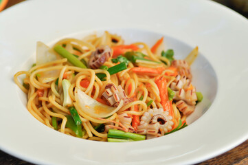 spaghetti , squid spaghetti or seafood spaghetti.
