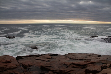 waves crashing on rocks