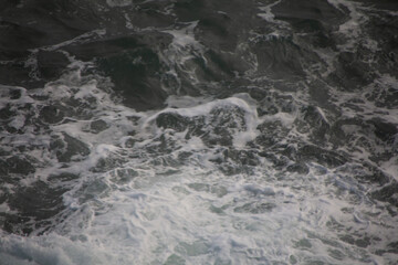 Waves crashing on rocks