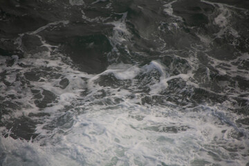 Waves crashing on rocks