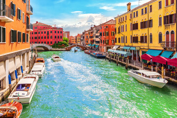 Fototapeta na wymiar Grand Canal, bridges and colorful houses of Venice, Italy