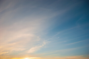 Naklejka na ściany i meble Evening sunset with beautiful clouds and sky.