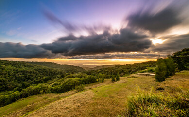 Foothills of Monteverde.  Panoramic view in beautiful orange sunset. Santa Elena in Costa Rica highlands.