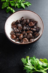 sun-dried olives smoked pitted olive fruit healthy meal food snack on the table copy space food background rustic top view keto or paleo diet veggie vegan or vegetarian food