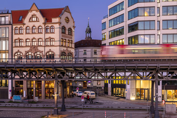 Obraz premium Hamburg, Germany. Subway in the harbor at sundown.