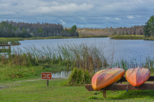 Kayaks at the boat launch on Mac Lake, Colt Creek State Park, Lakeland, Polk County, Florida