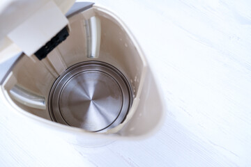 Calcified electric kettle after cleaning, the result of descaling agent or citric acid