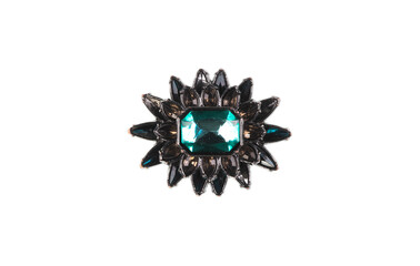 brooch with emerald on a white background