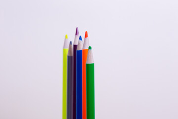Pencils on a green background. wooden pencils. green pencils