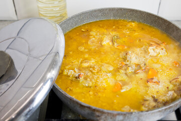 Ingredients for pilaf. Carrots, onion bulbs, rice, sliced meat, salt, barberry, saffron, cumin powder, oil. Step-by-step cooking process.