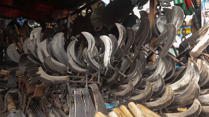 Lots of traditional knives(Boti Da) is prepared to sell in the store in Dhaka, Bangladesh
