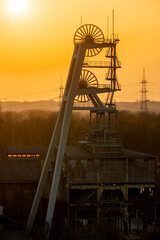 Mining Headframe Orange backlight sunset telephoto