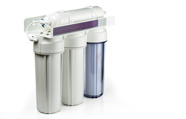 Three stage home water filtration system isolated on a white.