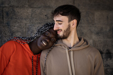Portrait of affectionate biracial couple of young people