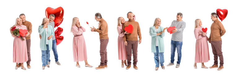 Mature couple with flowers and gift on white background. Valentine's Day celebration