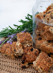 Glass jar with Traditional South African health rusks on rustic table
