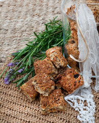 Glass jar with Traditional South African health rusks on rustic table