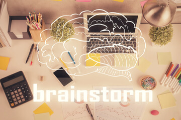 Start up theme drawing over computer on the desktop background. Top view. Double exposure....