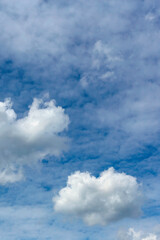 a large cumulus cloud on a background of blurry cirrus clouds as a natural background
