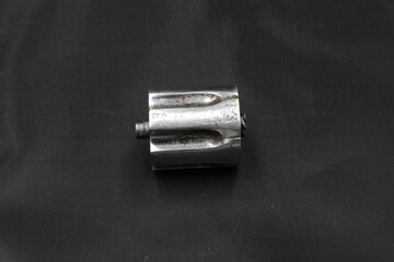 revolver cylinder on black background