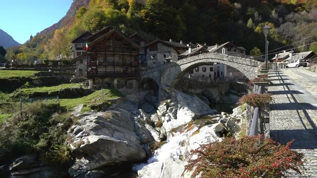 The beautiful village of Rassa, during fall season, in Valsesia (Sesia Valley). Province of Vercelli, Piedmont, Italy.
