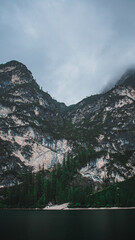 Fototapeta na wymiar emerald Braies lake in the mountains, Domlomites Alps 