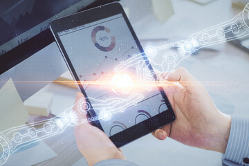 Multi exposure of man's hands holding and using a digital device and data theme drawing. Innovation concept.