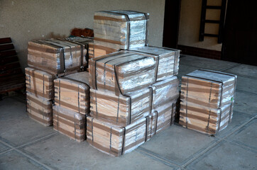 Packages with wooden parts for new hives. parcel delivery by parcel delivery service. The carpentry...